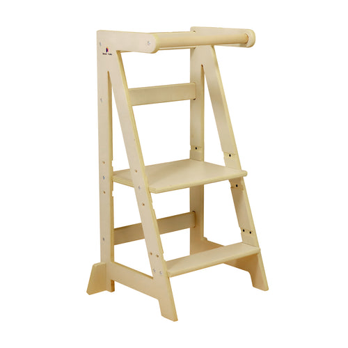 Child standing safely in Eiffel Tower-inspired learning tower