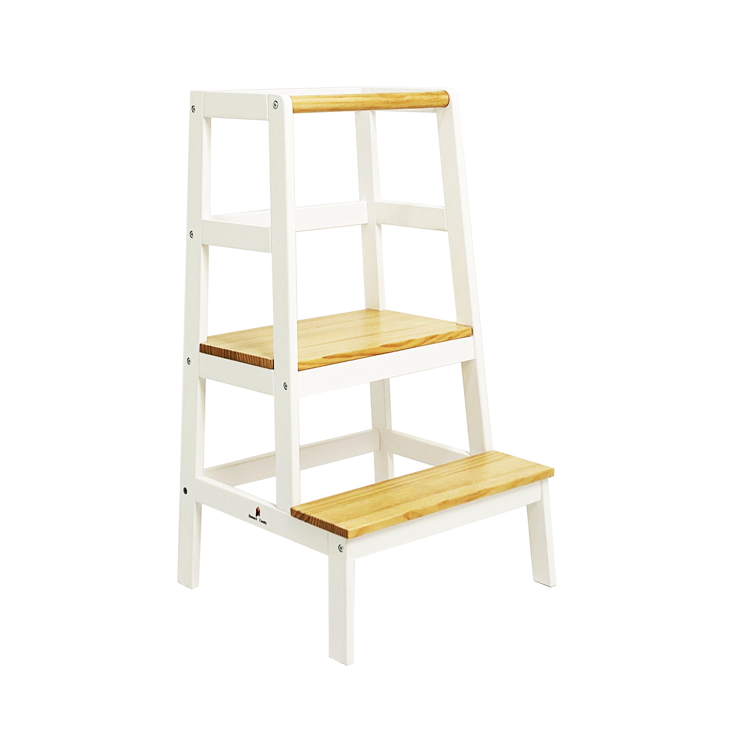Toddler safely standing in natural wood learning tower helping parents cook